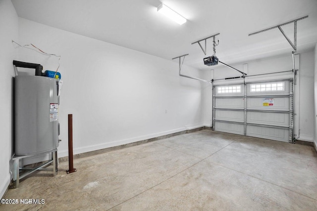 garage with electric water heater, a garage door opener, and baseboards