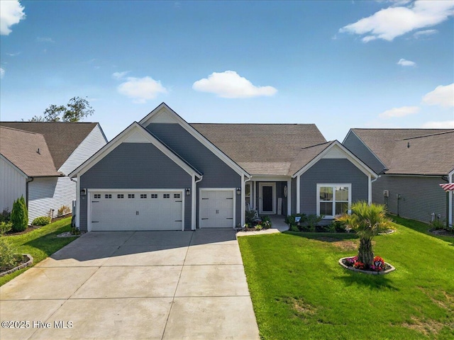 97 Eagle Claw Dr, Calabash, NC 28467 - view of front facade with an attached garage, driveway, and a front lawn