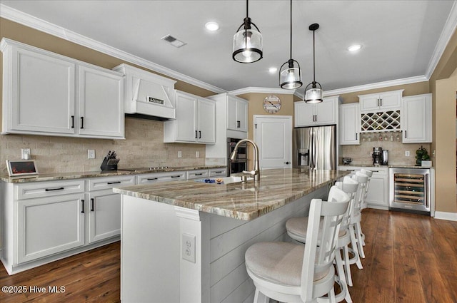 97 Eagle Claw Dr, Calabash, NC 28467 - kitchen featuring stainless steel refrigerator with ice dispenser, beverage cooler, backsplash, white cabinetry, and dark wood-type flooring