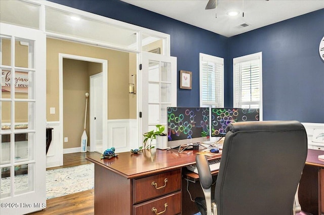 97 Eagle Claw Dr, Calabash, NC 28467 - office with a ceiling fan, dark wood-style flooring, and a wainscoted wall