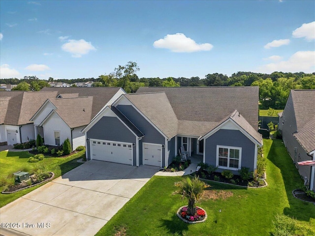 97 Eagle Claw Dr, Calabash, NC 28467 - view of front of property featuring a garage, driveway, and a front yard