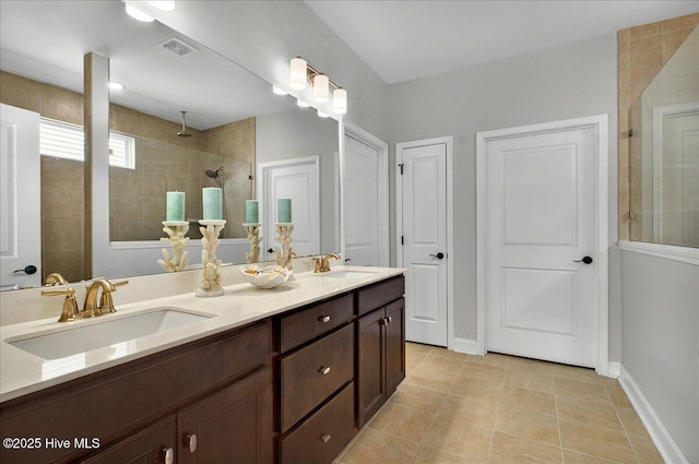 97 Eagle Claw Dr, Calabash, NC 28467 - full bath with double vanity, walk in shower, tile patterned floors, and baseboards