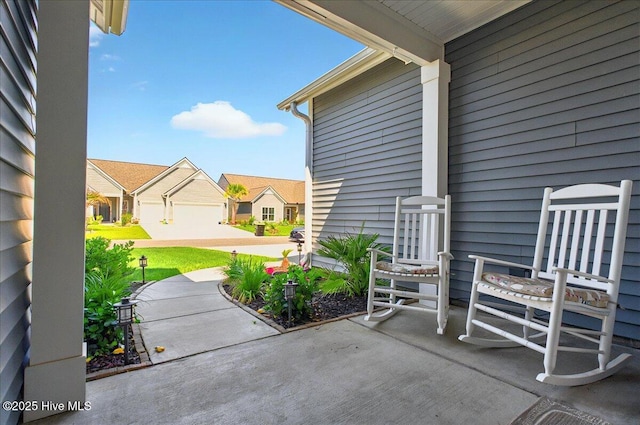 97 Eagle Claw Dr, Calabash, NC 28467 - view of patio featuring a residential view