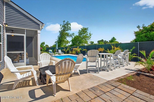 97 Eagle Claw Dr, Calabash, NC 28467 - view of swimming pool featuring a fenced backyard, a patio, and a sunroom