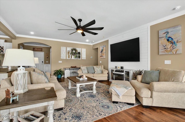97 Eagle Claw Dr, Calabash, NC 28467 - living area featuring ceiling fan, ornamental molding, wood finished floors, recessed lighting, and arched walkways