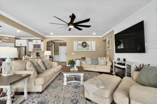 97 Eagle Claw Dr, Calabash, NC 28467 - living room featuring a ceiling fan, arched walkways, recessed lighting, ornamental molding, and wood finished floors