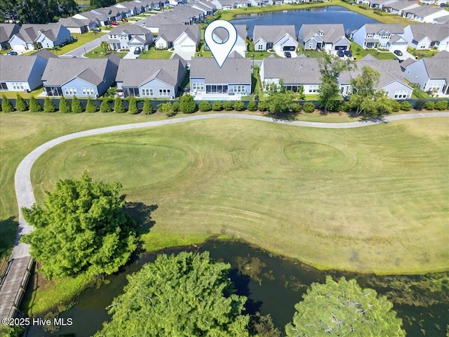 97 Eagle Claw Dr, Calabash, NC 28467 - aerial perspective of suburban area featuring a golf course and a large body of water