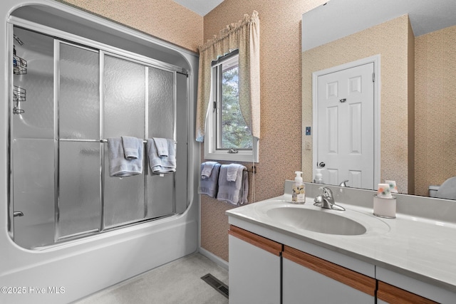106 Millstone Rd, West End, NC 27376 - full bathroom with vanity, bath / shower combo with glass door, and wallpapered walls