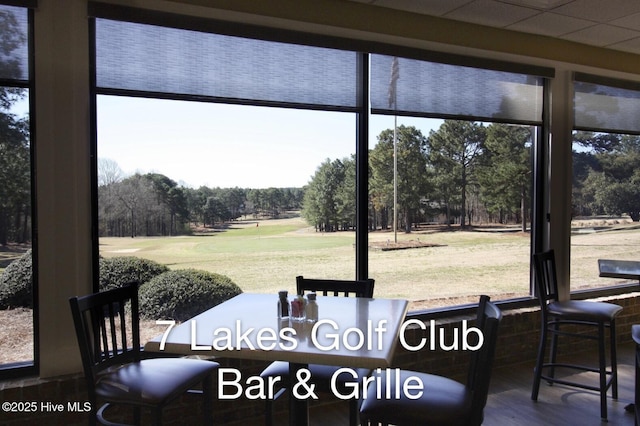 106 Millstone Rd, West End, NC 27376 - dining area featuring view of wooded area and plenty of natural light