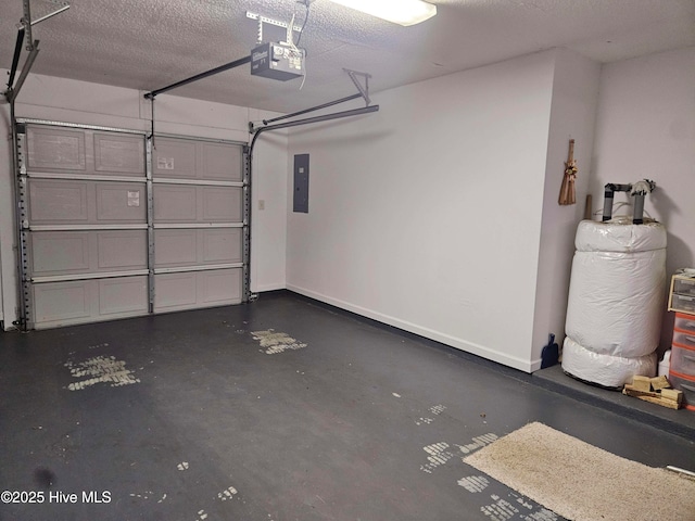 garage featuring a garage door opener, electric panel, and baseboards