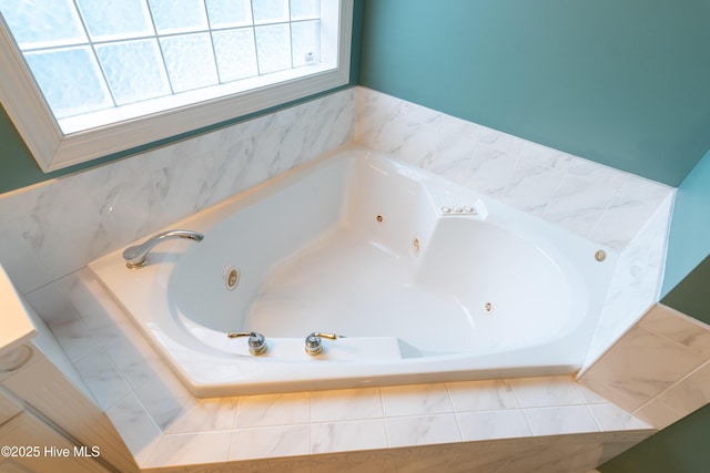 bathroom featuring a whirlpool tub