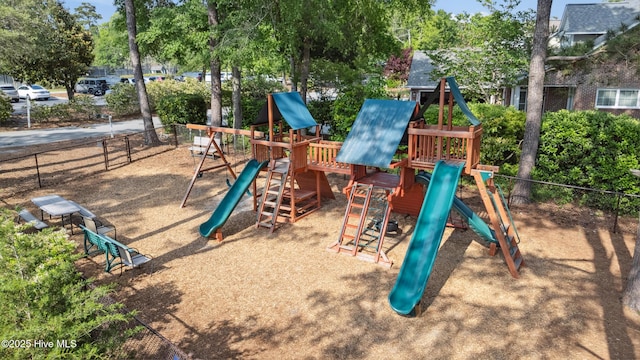 view of jungle gym with fence