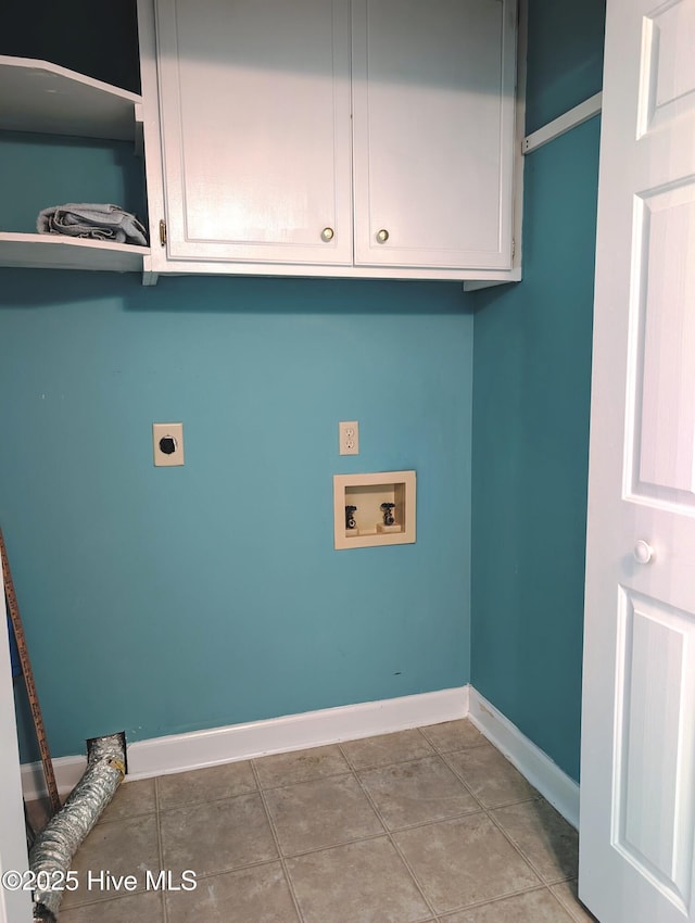 laundry area featuring hookup for an electric dryer, hookup for a washing machine, baseboards, and cabinet space