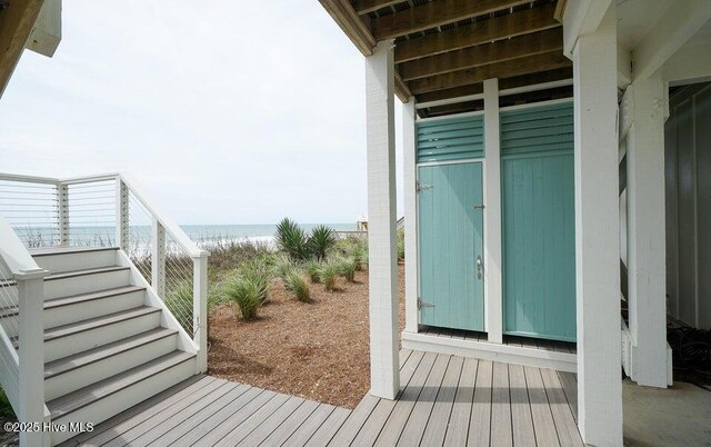 30 Porpoise Pl, North Topsail Beach, NC 28460 - property entrance featuring view of water and beach
