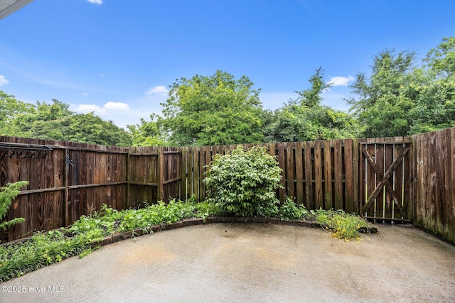 view of patio featuring a fenced backyard