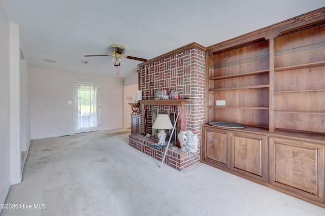 15554 US Highway 421, Burgaw, NC 28425 - unfurnished living room with a ceiling fan, carpet floors, and a fireplace