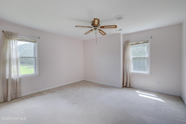 15554 US Highway 421, Burgaw, NC 28425 - empty room featuring plenty of natural light, a ceiling fan, and carpet floors