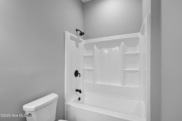 bathroom with toilet and shower / bathtub combination