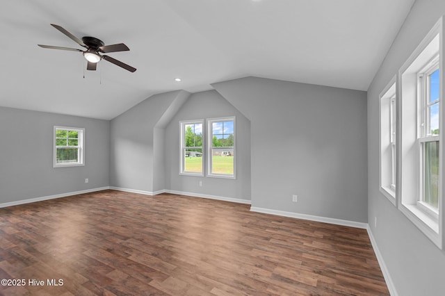 bonus room featuring wood finished floors, lofted ceiling, ceiling fan, baseboards, and recessed lighting