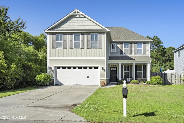 202 Bungalow Rd, Holly Ridge, NC 28445 - craftsman inspired home with driveway, a garage, roof with shingles, stone siding, and board and batten siding