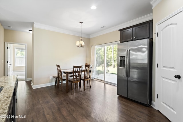 202 Bungalow Rd, Holly Ridge, NC 28445 - dining room featuring dark wood-type flooring, a chandelier, ornamental molding, baseboards, and recessed lighting