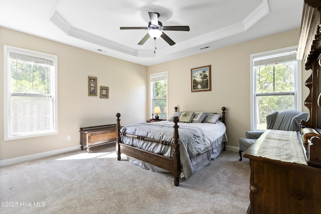 202 Bungalow Rd, Holly Ridge, NC 28445 - bedroom with a raised ceiling, ornamental molding, light colored carpet, baseboards, and a ceiling fan