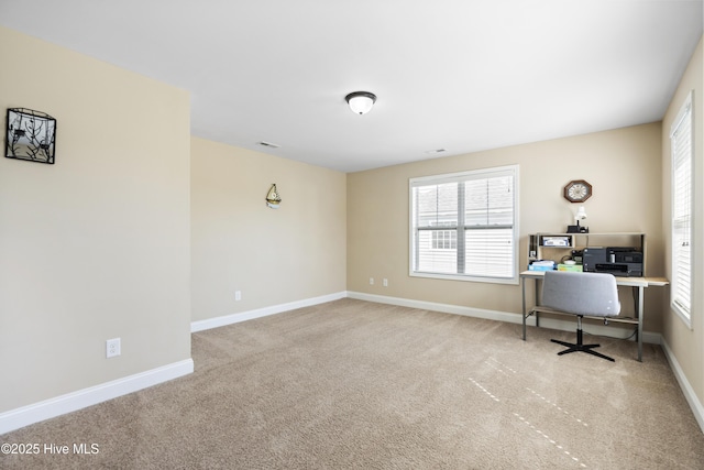 202 Bungalow Rd, Holly Ridge, NC 28445 - unfurnished office with carpet flooring, healthy amount of natural light, and baseboards