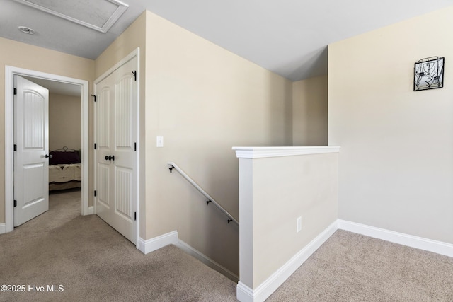 202 Bungalow Rd, Holly Ridge, NC 28445 - staircase featuring carpet, baseboards, and attic access