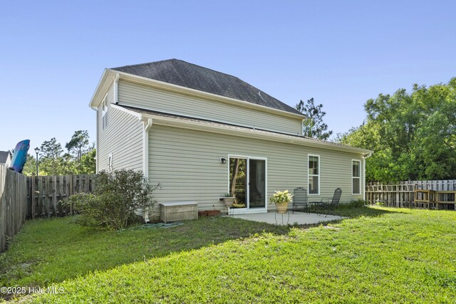 202 Bungalow Rd, Holly Ridge, NC 28445 - rear view of property with a patio area
