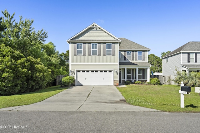 202 Bungalow Rd, Holly Ridge, NC 28445 - view of front of house with driveway, an attached garage, and board and batten siding
