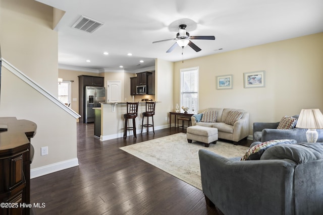 202 Bungalow Rd, Holly Ridge, NC 28445 - living area with healthy amount of natural light, a ceiling fan, recessed lighting, baseboards, and crown molding
