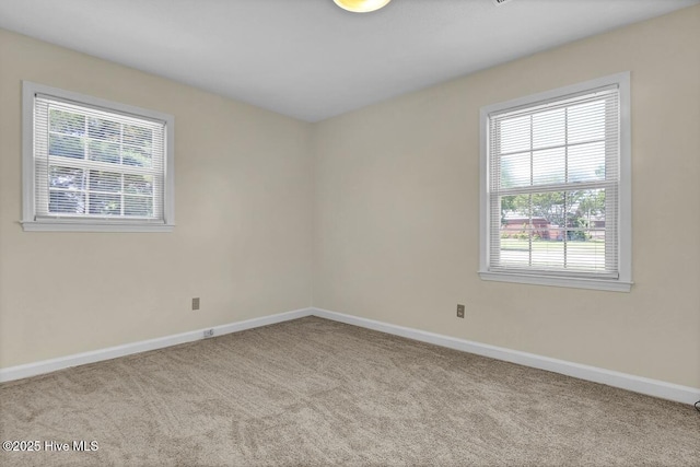 805 Hamlet Ave, Carolina Beach, NC 28428 - carpeted spare room featuring baseboards