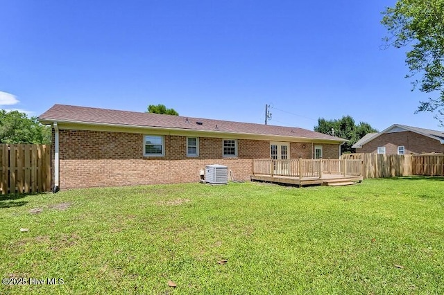 805 Hamlet Ave, Carolina Beach, NC 28428 - rear view of property with cooling unit, a deck, and brick siding