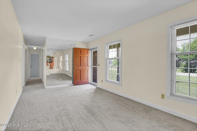 805 Hamlet Ave, Carolina Beach, NC 28428 - carpeted spare room featuring baseboards