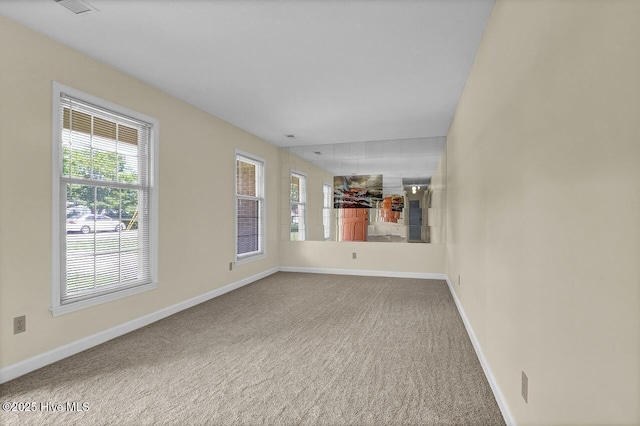 805 Hamlet Ave, Carolina Beach, NC 28428 - unfurnished room featuring baseboards and carpet flooring