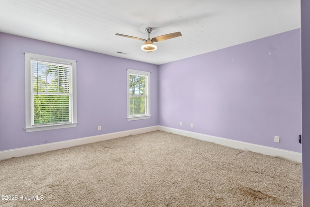 5613 Swiss Stone Ct, Wilmington, NC 28412 - spare room with baseboards, carpet, and a ceiling fan