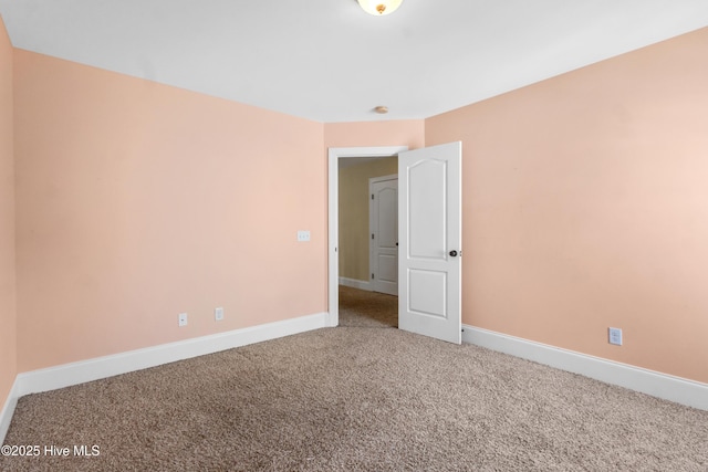 5613 Swiss Stone Ct, Wilmington, NC 28412 - carpeted empty room featuring baseboards