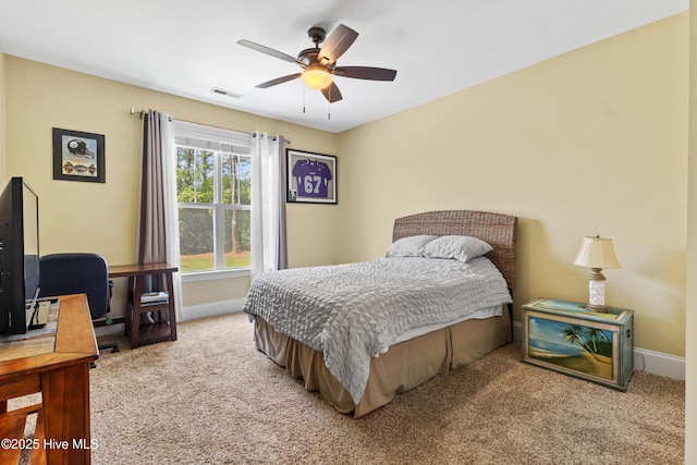 5613 Swiss Stone Ct, Wilmington, NC 28412 - carpeted bedroom with baseboards, an office area, and a ceiling fan