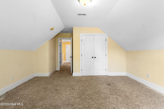 5613 Swiss Stone Ct, Wilmington, NC 28412 - additional living space featuring carpet flooring, vaulted ceiling, and baseboards