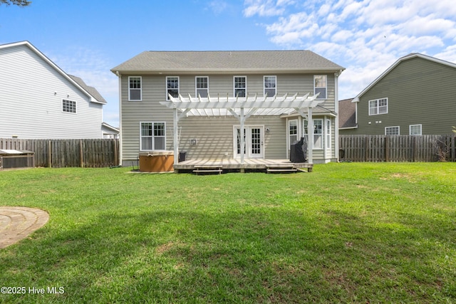 5613 Swiss Stone Ct, Wilmington, NC 28412 - rear view of property with a pergola, a wooden deck, and a hot tub