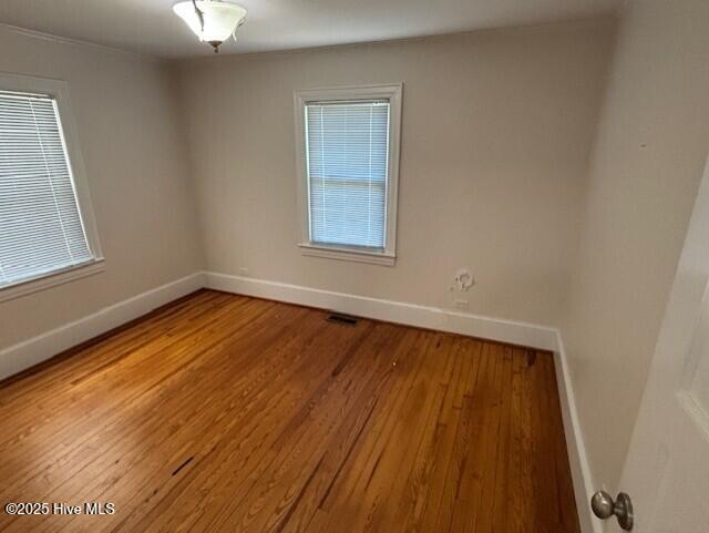 314 Madam Moores Ln, New Bern, NC 28562 - empty room with baseboards and light wood-style floors