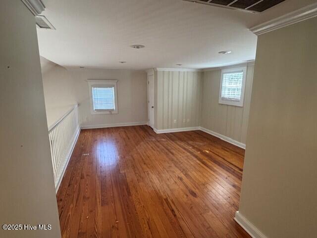 314 Madam Moores Ln, New Bern, NC 28562 - spare room featuring wood finished floors and crown molding
