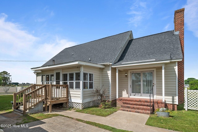 120 Oakes Rd, Hookerton, NC 28538 - view of front of property featuring a shingled roof and a chimney