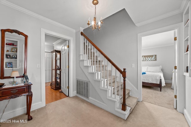 120 Oakes Rd, Hookerton, NC 28538 - stairway with carpet, crown molding, a chandelier, and baseboards