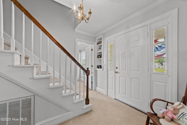 120 Oakes Rd, Hookerton, NC 28538 - entryway with stairway, a chandelier, carpet, and crown molding