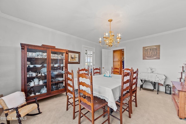 120 Oakes Rd, Hookerton, NC 28538 - dining space featuring light carpet, a chandelier, and crown molding