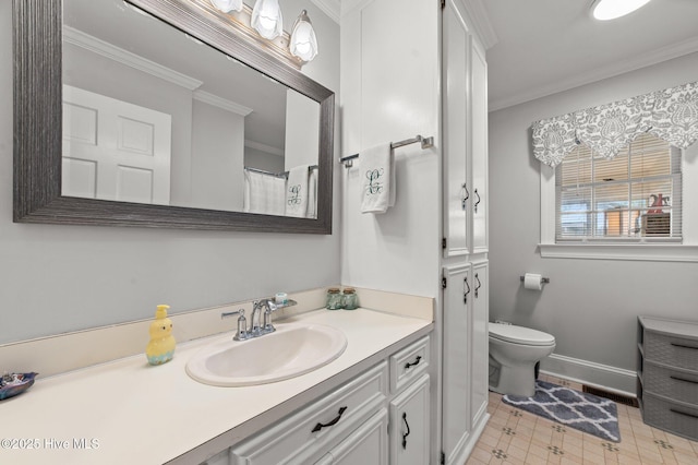120 Oakes Rd, Hookerton, NC 28538 - bathroom with ornamental molding, vanity, toilet, and baseboards