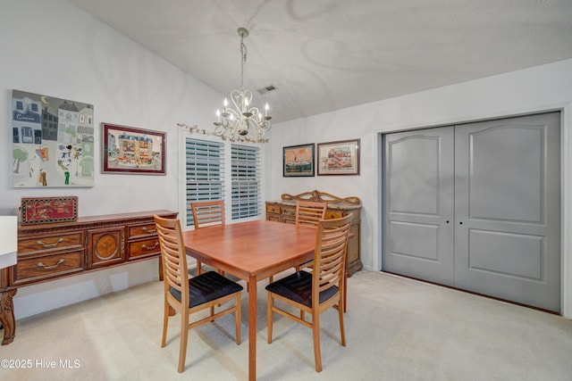 3508 Whispering Pines Ct, Wilmington, NC 28409 - dining space featuring a chandelier, lofted ceiling, and light carpet