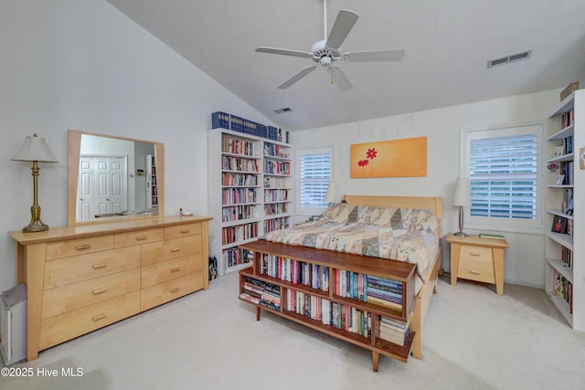 3508 Whispering Pines Ct, Wilmington, NC 28409 - carpeted bedroom with lofted ceiling, multiple windows, and ceiling fan