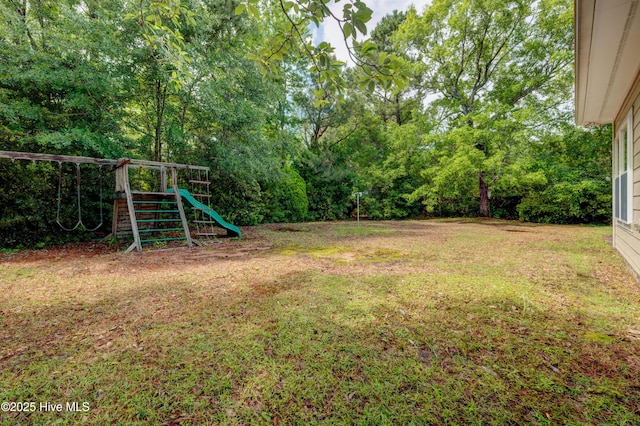 3508 Whispering Pines Ct, Wilmington, NC 28409 - view of grassy yard featuring a playground